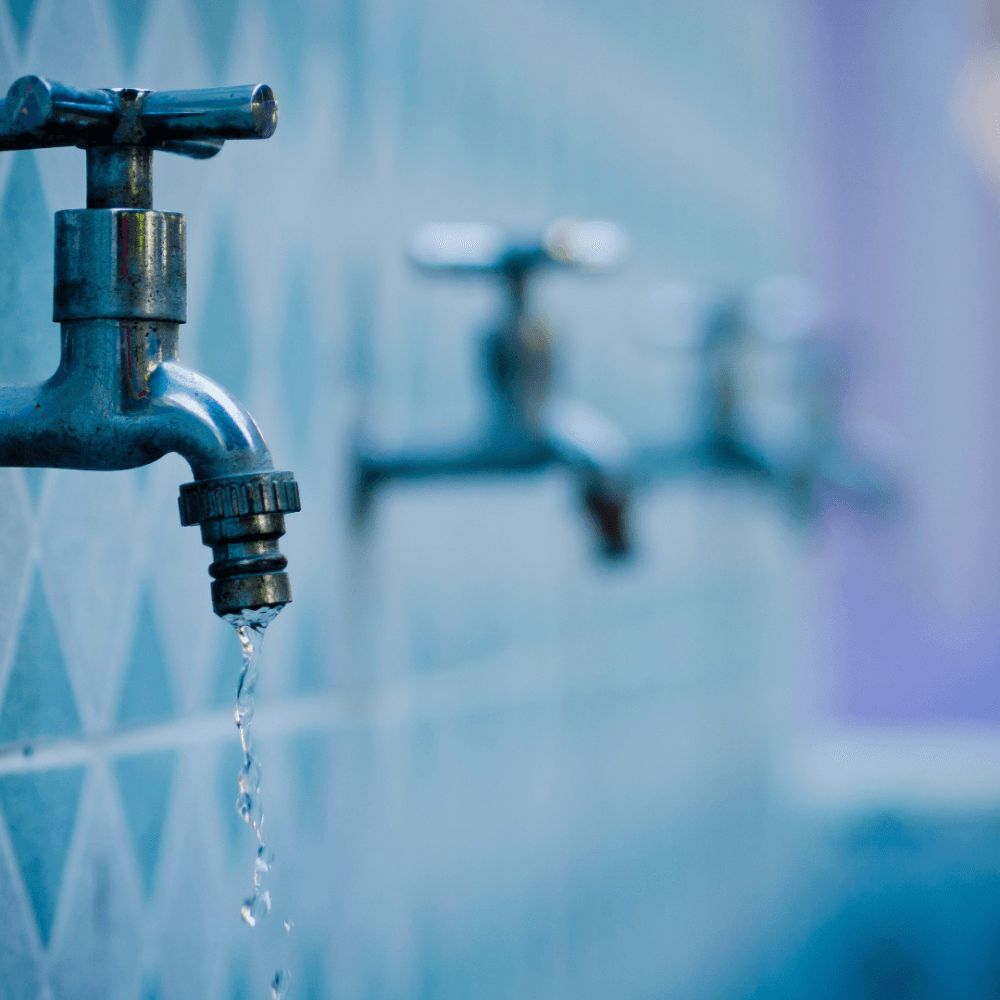 There is an image of a water leak from a pipe.